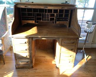 #25	roll top desk with 8 drawers 48x32x48	 $100.00 			
