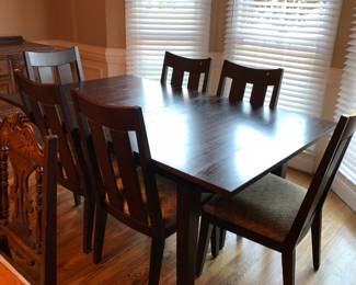 #117	 Black Table w/6 chairs - 70x42x30	 $175.00 			
