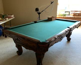 #93	Wood Pool Table w/balls & Pool Cues w/rack - 54x98 - You pay for movers upstairs (as is scratches)	 $300.00 			
