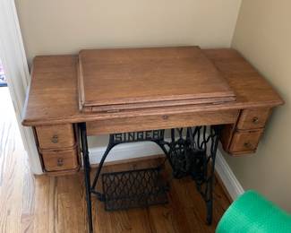 #22	treadle singer sewing machine, 4 drawers	 $75.00 			
