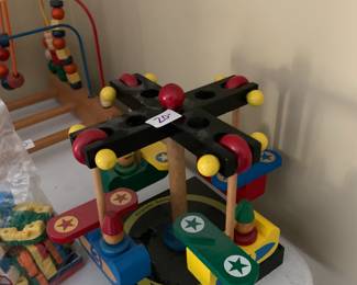 #100	Wood Merry Go Round w/planes	 $20.00 			
