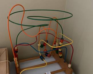 #99	Wooden Toy w/metal Slide for Beads	 $20.00 			
