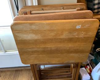 #19	4 TV trays, wooden and on stand 	 $25.00 			
