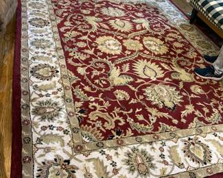 #18	machine made wool burgundy and white rug 8'x10' as is finish	 $75.00 			
