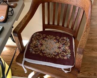 #35	oak desk chair with needlepoint cushion	 $35.00 			

