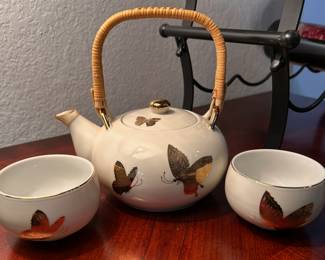 tea set with gold embossed butterflys