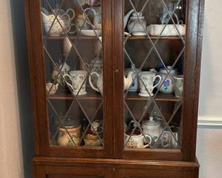 antique wood cabinet with leaded glass