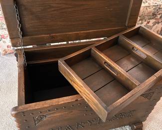 beautifully carved replica with nailhead trim