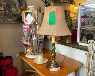 Heavy based, brass candlestick style lamp with contemporary, curved and thin lamp shade. | Assorted postcard, maps, notecards