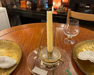 Cut crystal and brass rimmed taper candle holder. | Clear glass plate with brass rim.