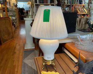 White ceramic and brass bottomed ginger jar-style lamp with white pleated black shade
