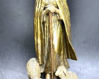 One of a pair of antique terracotta pottery figure of a girl shepherding ship. It was designed & signed by R. Dubitzky who did a lot of design work for Bernard Block