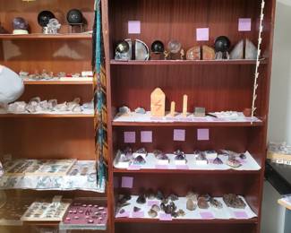 All types of semi-precious stones in all shapes, styles, colors. Everything from raw stones, to slabs, globes, to jewelry.