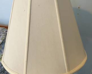 Chinese porcelain table lamp with a lattice-style base and a gold butterfly finial