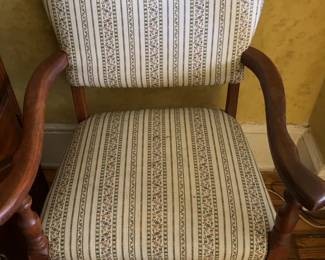 Empire-style Upholstered Armchair With a Striped Fabric Seat and Backrest.