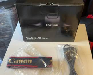 Canon EOS-1D X Mark II Box (no camera included) with manual, Canon camera strap and USB cable