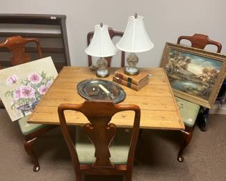 Table and needlepoint chairs