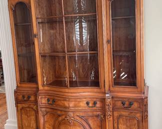 Antique solid wood breakfront china cabinet pre1960 bought at a Chicago Furniture Market.
54x18x77