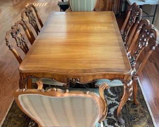 This table has two leaves and three more chairs. Bought at the Chicago furniture market before 1960.