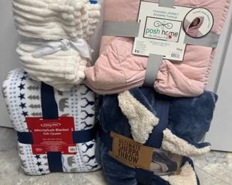 Four Brand New Plush Blankets