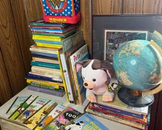 Collection Of Childrens Books With Globe