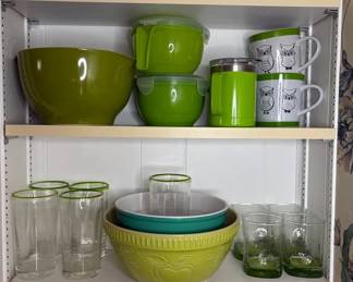 A Green Lovers Kitchen With Glasses Mixing Bowls And More