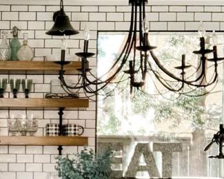 Chandelier, EAT sign, glassware, greenery, shelf brackets