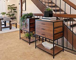 Crate & Barrel hutches, floor plants, books, greenary and home decor