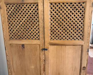 Entertainment center/armoire with lattice doors