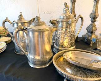 Silver plate pitchers, including Reed + Barton