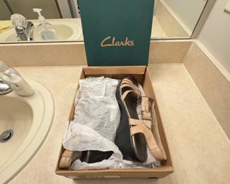 pair of sandals by Clark