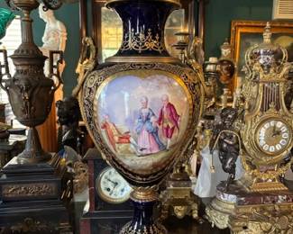 Sevres style porcelain and gilt bronze mounted lidded vase.