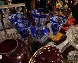 Cobalt glasses and a cut to clear vase