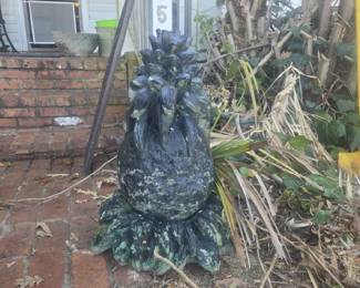 HUGE concrete statue. Rescued from the jungle! Found this beauty between some old palm trees huge pineapple and base. 
( 2 sections) 