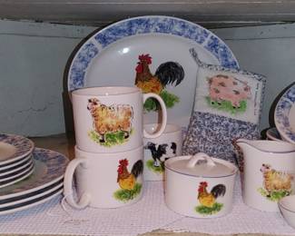 Country Barn Tabletops Unlimited ROOSTER dishes 
8 bowls 
3 plates 
5 salad plates
1 serving platter 
3 coffee cups 
1 sugar dish with lid 
1 creamer and 
1  spoon rest