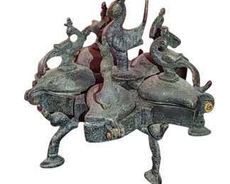 Kumkum or spice box. & special powders/ for medicinal purposes .each lid is held down by the middle peacock that screws into the base.
It is typically made of cast brass with intricate designs featuring peacocks and sometimes elephants.
Made in Nepal