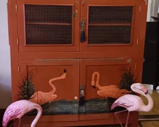 And then antique primitive pine cupboard original to the house ( my brother painted the cabinet I can't have read orange color with flamingos on the front