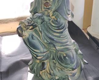 Guanyin Statue 
is the Chinese name for the Buddhist bodhisattva Avalokiteshvara, embodying compassion. 