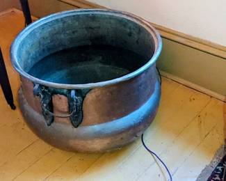 Early & Large copper cauldron Forged iron handles ( originally @ the old Pasley hotel that burned down) 
When the old Pasley hotel burned down many things that were salvaged were stored at Maggie's Pasleys house/ or barns & remained here) 