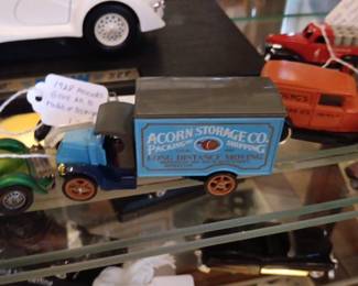 Matchbox Models of Yesteryear Y-30 1920 Model AC Mack die-cast toy truck, featuring the "Acorn Storage Co." livery. 