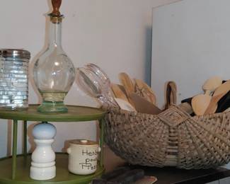 Vintage buttocks basket with kitchen utensils