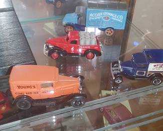 Ertl 1930 Chevrolet Series AD 1/2-Ton Deluxe Delivery YOUNG'S Coal & Ice Truck orange one

Matchbox Models of Yesteryear Y-23 1930 
Mack Tanker Goodyear Diecast Truck 

Lledo Texaco 1996 Atlanta Olympics die-cast 1937 Chevrolet pickup truck

Matchbox Superfast Model A Ford diecast toy van.
