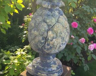 Vintage pineapple garden statue cracked but not falling apart