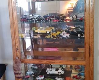 Here are the model cars from Dr mixon's office & the curio they are in from them office
Solid oak lighted and mirrored curio cabinet