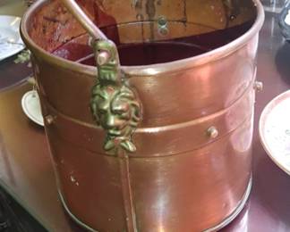Antique Solid copper coal bucket were popular during the Victorian and Edwardian Arts and Crafts periods.
They were traditionally used next to a fireplace to store coal or kindling.
This one is especially beautiful with Lions head hardware