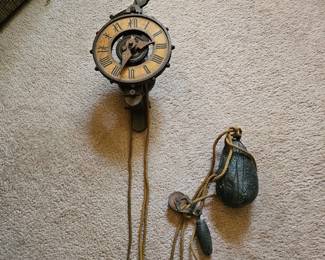 very unique clock with stone pendulum
