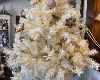 beautiful white tree with pretty ornaments