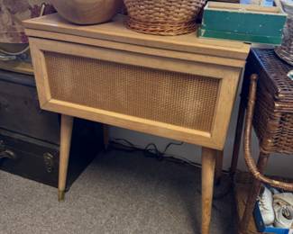 Vintage Sewing Machine in MCM cabinet (as is, not sure if it works) could also be used as a MCM side table 