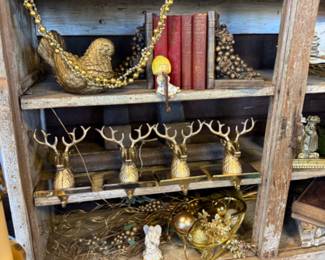 Reindeer stocking holders, vintage gold birds, book ends, lots of gold touches