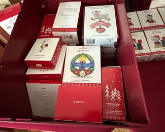 2 red hallmark storage containers from the store 